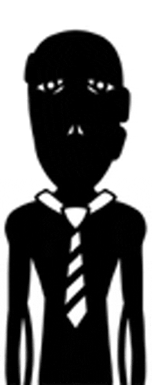 a silhouette of a man in a suit and tie .