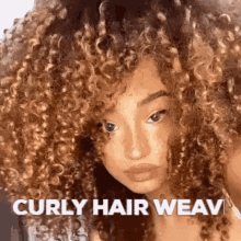 a close up of a woman 's face with curly hair and the words `` curly hair weaving '' .