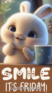 a bunny rabbit is smiling and holding a cup of coffee .