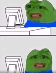 a green frog is sitting at a desk in front of a computer monitor .