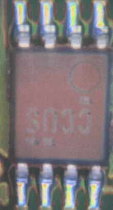 a close up of a circuit board with the number s005 on it