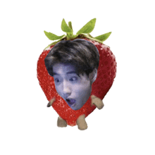 a strawberry with a boy 's face on it