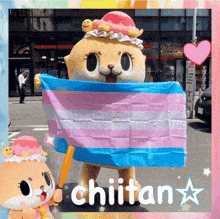 a chiitan mascot holding a transgender flag in front of a building