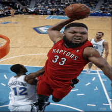 basketball player wearing a red jersey with the number 33
