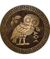 a coin with an owl and the word aok