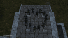 a group of soldiers are standing on a tiled floor and the bottom left corner of the screen says " bottom right "