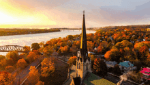 an aerial view of a church with a cross on top of it