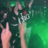a person wearing a shirt that says i love king