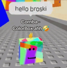a colorful cube with a face and a speech bubble that says hello broski cornba colorbox ahh