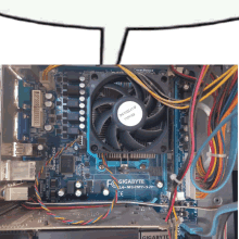 the inside of a computer with a gigabyte motherboard and a fan