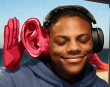 a man wearing headphones and a pair of red gloves