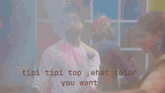 a blurry picture of a man and a woman with the words " pi tipi top what color you want " visible