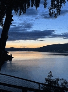 a view of a lake with mountains in the background