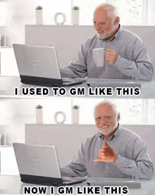 an older man sitting at a desk with a laptop and a cup of coffee giving a thumbs up sign