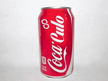 a can of coca-cola is sitting on a table