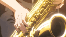 a close up of a person playing a saxophone with the letters k and t on it