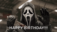 scream is holding a bloody knife and says happy birthday .