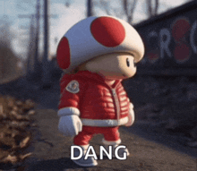 a toad wearing a red jacket and white pants is walking down a sidewalk with the word dang above him