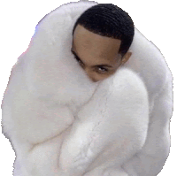 a man wrapped in a white fur coat covering his face