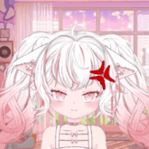 a little girl with white hair has a red arrow on her forehead