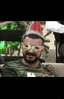 a man with a beard wearing a party hat and a mask