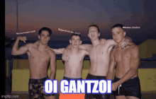 a group of young men are posing for a picture and the caption says oi gantzoi