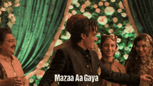 a movie poster for mazaa aa gaya shows a man in a suit