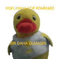 a stuffed yellow duck with a red beak and the words huhuhaha çok komikmis bir daha olmasin