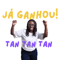 a woman in a white shirt is holding her arms up in the air with the words ja ganhou tan tan tan behind her