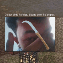 a picture of a man with a knife on his forehead with the caption " disaat cinta kandas "