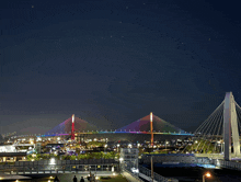 a bridge with a rainbow of lights on it