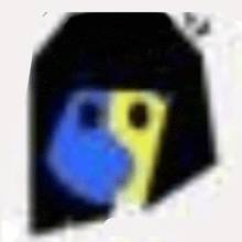 a blurry picture of a person 's face with a blue and yellow face