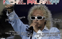 a poster of a man singing into a microphone with the name michel palareff on it