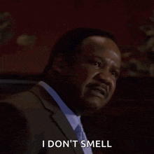 a man in a suit says eeeee i don t smell