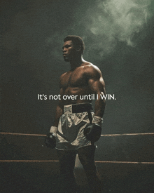 a poster of a boxer with the words " it 's not over until i win " below him