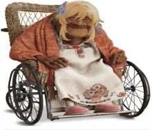 an elderly woman is sitting in a wheelchair with pink slippers on