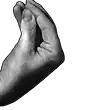 a black and white photo of a person 's hand holding something .