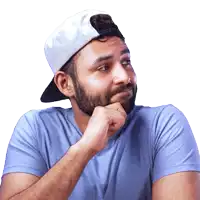 a man with a beard is wearing a white hat and a blue shirt