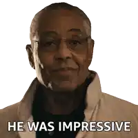 a man with glasses says he was impressive on a white background