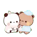 two teddy bears are sitting next to each other and hugging each other .