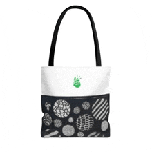 a black and white tote bag with a green logo on the front