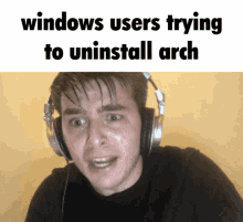 a man wearing headphones is making a funny face with the words windows users trying to uninstall arch