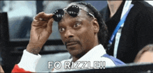 snoop dogg wearing sunglasses with the words fo rizzle written above him