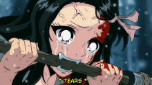 a girl is crying while holding a stick with the word tears below her