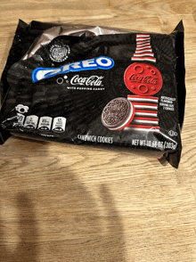 a package of oreo coca cola sandwich cookies on a wooden table