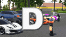 a bunch of cars are parked in a parking lot and the letter d is visible