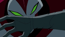 a close up of a cartoon character 's hand with green eyes