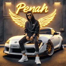 a man sits on the hood of a toyota supra