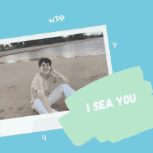 a picture of a man sitting on a beach with the words " i sea you " below him