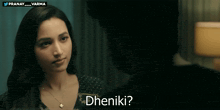 a man and woman are looking at each other and the woman says dhenki
